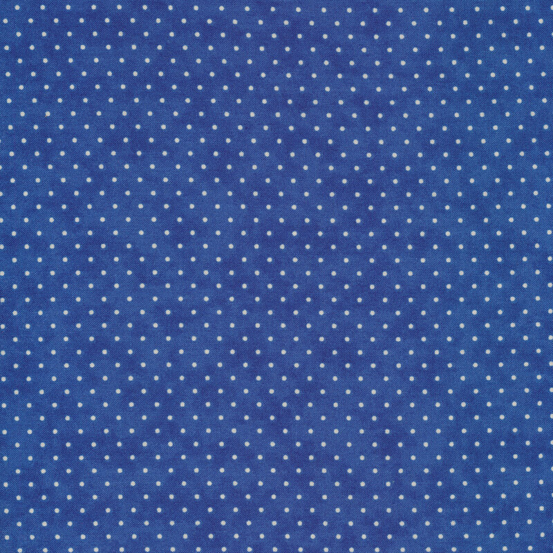 royal blue fabric with small white polka dots all over