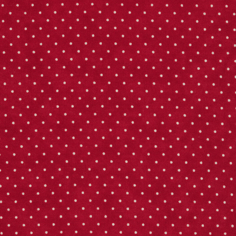 Country red fabric with small white polka dots throughout