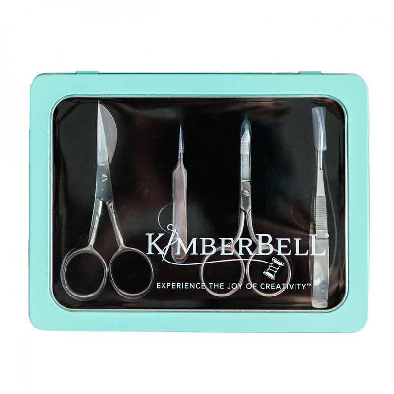 A teal box containing four sewing tools: scissors, a seam ripper, an awl, and tweezers.